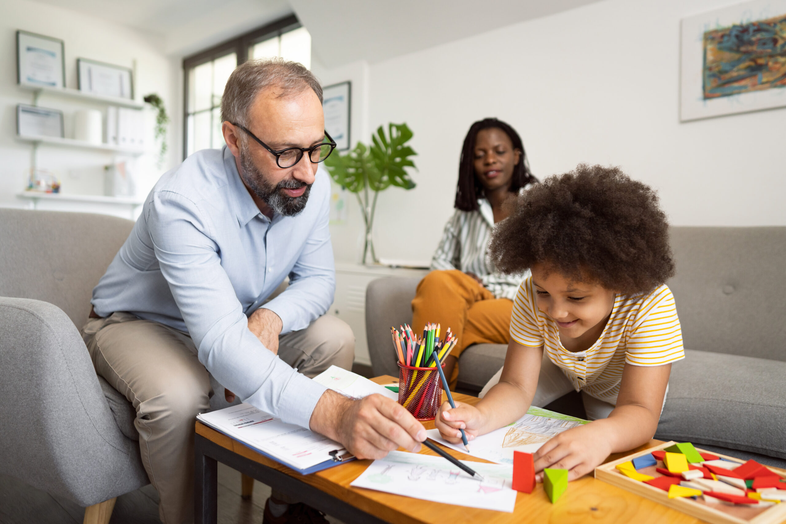 Psychologist with child for autism assessment